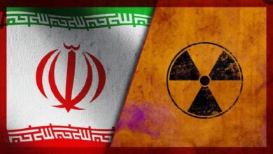 نماد رادیو اکتیو در کنار پرچم ایران _ اطلس دیپلماسی
